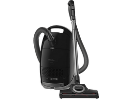 Aspirateur Miele noir avec un tuyau et une poignée, et une tête de nettoyage de sol sur fond noir.