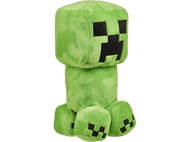 Une peluche Creeper verte de Minecraft sur fond noir.