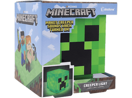 Lumière Creeper Minecraft dans une boîte. Visage vert de Creeper sur la boîte. Personnages à gauche.
