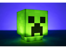 Charger l&#39;image dans la galerie, Lampe Creeper verte Minecraft brillant sur surface sombre.
