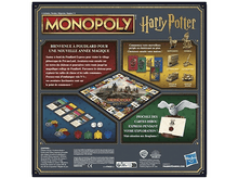 Charger l&#39;image dans la galerie, Dos d&#39;une boîte de jeu Monopoly Harry Potter avec des instructions et des images.
