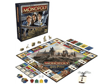 Charger l&#39;image dans la galerie, Jeu Monopoly Harry Potter avec plateau, pièces et boîte. Le plateau montre Poudlard.
