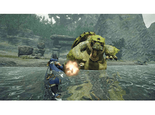 Charger l&#39;image dans la galerie, Un personnage tire sur un grand monstre vert dans l&#39;eau. Arbres et montagnes en arrière-plan.
