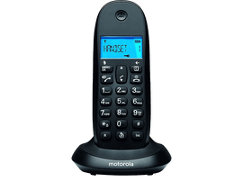 Téléphone sans fil Motorola noir sur son socle. Écran bleu, clavier.