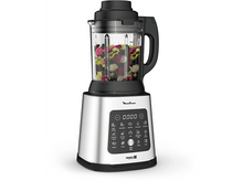 Charger l&#39;image dans la galerie, Mixeur argenté avec des fruits à l&#39;intérieur, couvercle noir.
