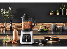 Charger l&#39;image dans la galerie, Gros plan sur une caméra d&#39;appareil crème avec un objectif noir et un petit capteur.
