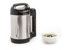 Charger l&#39;image dans la galerie, Un appareil à soupe en acier inoxydable avec un bol de soupe sur fond blanc.
