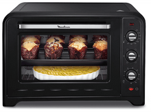 Charger l&#39;image dans la galerie, Four noir avec des muffins et un plat de nourriture à l&#39;intérieur.
