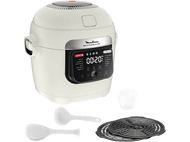 Un Moulinex Multicooker & Fry avec des accessoires, y compris des cuillères et des grilles, sur un fond noir.