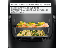 Charger l&#39;image dans la galerie, Un four noir avec deux grilles, cuisinant des aliments sur les deux niveaux.
