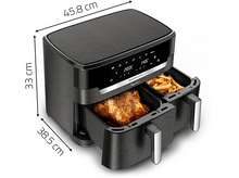 Charger l&#39;image dans la galerie, Friteuse à air noire avec deux compartiments, un avec poulet frit, l&#39;autre avec frites.
