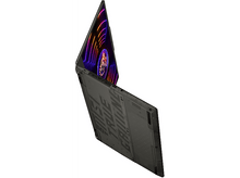 Charger l&#39;image dans la galerie, Un ordinateur portable gris foncé est ouvert, affichant un écran avec un design coloré et lumineux. Le logo MSI est visible.
