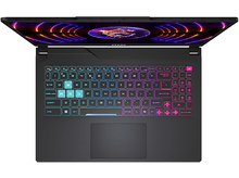 Charger l&#39;image dans la galerie, Vue de dessus d&#39;un ordinateur portable avec un clavier illuminé de plusieurs couleurs.
