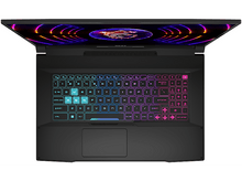 Charger l&#39;image dans la galerie, Vue de dessus du clavier d&#39;un ordinateur portable, avec des touches illuminées colorées.
