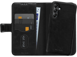 Étui de téléphone noir avec portefeuille, cartes de crédit et argent. Un téléphone noir à droite.