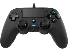 Charger l&#39;image dans la galerie, Manette PlayStation noire avec boutons, joysticks et une prise casque.
