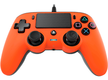 Charger l&#39;image dans la galerie, Manette de jeu orange avec boutons. Joysticks noirs et croix directionnelle.

