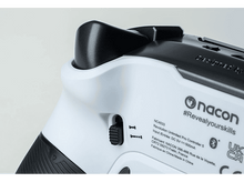 Charger l&#39;image dans la galerie, Une manette de jeu blanche et noire avec une poignée noire et des détails blancs.
