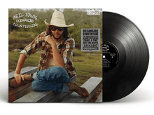 Charger l&#39;image dans la galerie, Pochette d&#39;album de Neil Young avec disque vinyle. Homme assis, portant chapeau et lunettes.
