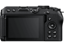 Charger l&#39;image dans la galerie, Vue arrière d&#39;un appareil photo numérique noir avec des boutons, un écran et diverses commandes.
