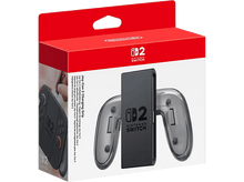 Charger l&#39;image dans la galerie, Poignée de charge Nintendo Switch Joy-Con dans une boîte rouge et blanche, avec une poignée noire et des manettes grises.
