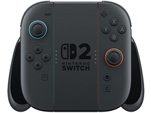 Charger l&#39;image dans la galerie, Manette Nintendo Switch noire avec boutons rouges et bleus. Logo Nintendo Switch présent.
