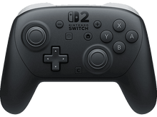 Charger l&#39;image dans la galerie, Une manette Pro Nintendo Switch noire avec des boutons et des joysticks.
