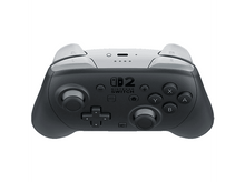 Charger l&#39;image dans la galerie, Manette Nintendo Switch Pro, noire avec des accents gris, boutons visibles.
