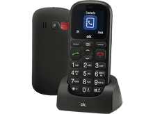 Charger l&#39;image dans la galerie, Téléphone mobile noir avec socle. L&#39;écran affiche l&#39;icône des contacts. Fond noir.
