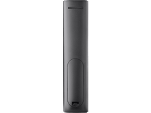 Charger l&#39;image dans la galerie, Télécommande noire, vue arrière, sur fond blanc.
