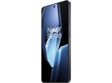 Charger l&#39;image dans la galerie, Un smartphone noir avec un écran affichant un design abstrait coloré.
