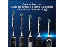 Charger l&#39;image dans la galerie, Têtes et manches de brosses à dents. Différentes couleurs. Fond bleu.
