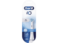Charger l&#39;image dans la galerie, Un pack Oral-B iO XL avec une tête de brosse à dents. L&#39;emballage est blanc et bleu.
