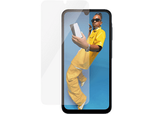 Charger l&#39;image dans la galerie, Téléphone avec protecteur d&#39;écran et un homme en vêtements jaunes tenant un téléphone.
