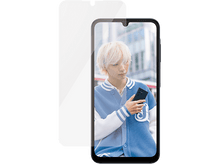 Charger l&#39;image dans la galerie, Une personne aux cheveux blonds tient un téléphone, portant une veste bleue. Un protecteur d&#39;écran est devant le téléphone.
