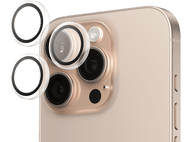 Gros plan d'un iPhone doré avec trois lentilles et deux caches objectifs détachés.