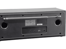 Charger l&#39;image dans la galerie, Vue arrière d&#39;une radio Nelson noire, avec antenne et ports de connexion visibles.
