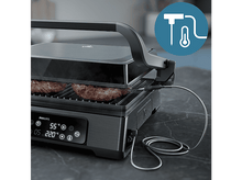 Charger l&#39;image dans la galerie, Gril Philips avec deux burgers, un couvercle fermé et une sonde. Cadre de cuisine moderne.
