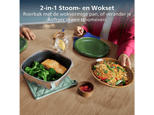 Charger l&#39;image dans la galerie, Une table avec de la nourriture. Un cuiseur vapeur contient du saumon et du brocoli. Un bol de nouilles est tenu. Un petit bol de piments.
