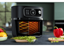 Charger l&#39;image dans la galerie, Friteuse à air noire avec compartiment ouvert, aliments et légumes.
