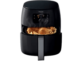 Une friteuse à air Philips noire avec du poulet et des frites à l