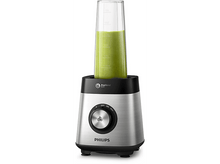 Charger l&#39;image dans la galerie, Un blender argenté avec un smoothie vert à l&#39;intérieur, avec un panneau de contrôle.

