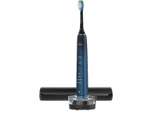 Charger l&#39;image dans la galerie, Une brosse à dents électrique bleue Philips Sonicare avec socle de chargement.
