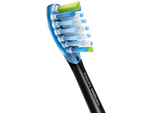 Charger l&#39;image dans la galerie, Gros plan sur la tête d&#39;une brosse à dents Philips Sonicare avec des poils bleus, blancs et verts.
