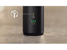 Charger l&#39;image dans la galerie, Un appareil noir avec des lumières vertes et une jaune, sur une surface en bois.
