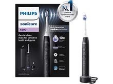 Charger l&#39;image dans la galerie, Brosse à dents électrique Philips Sonicare et accessoires sur fond blanc.
