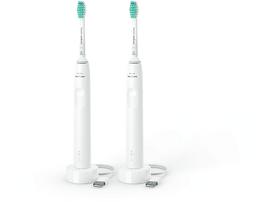 Deux brosses à dents électriques Philips Sonicare blanches avec socles.