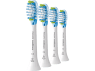 Quatre têtes de brosse à dents Philips Sonicare. Elles ont des poils bleus et verts et sont blanches.