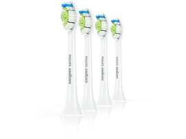 Quatre têtes de brosse à dents Philips Sonicare blanches avec des soies vertes et bleues, isolées.