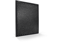 Filtre à air Philips noir avec motif en nid d'abeille, sur fond noir.